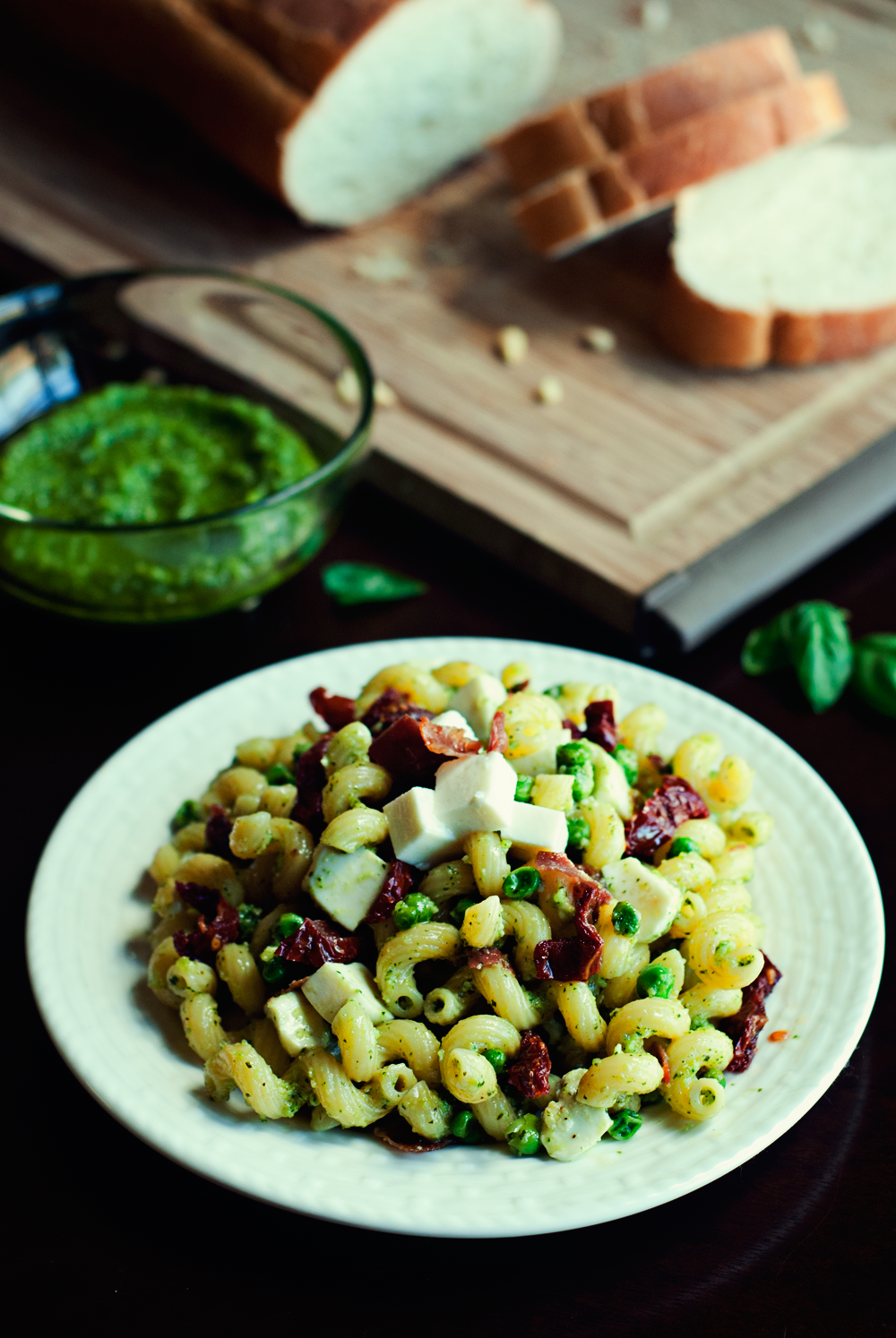 Pesto Pasta with Prosciutto, Peas, and Sun-Dried Tomatoes by Three in Three