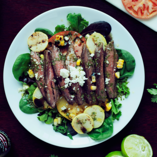 This seared steak salad with cilantro lime vinaigrette is so full of flavor you won't even remember you're eating a salad! #SauceOn #shop #cbias