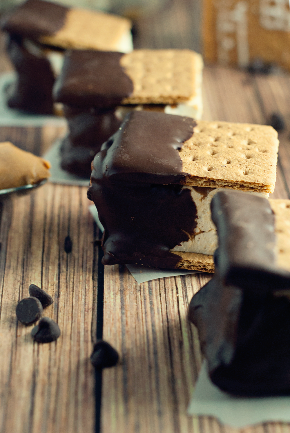 These chocolate peanut butter smores are sure to blow your mind with massive, fluffy, homemade marshmallows between crisp graham crackers, dripped in rich chocolate!