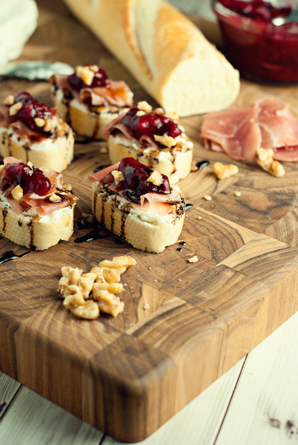 Make the perfect party appetizer with these goat cheese, prosciutto, and cranberry crostini!