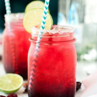 Be the talk of the party when you make this super simple, unique, and delicious Hibiscus Margarita Recipe! | asimplepantry.com