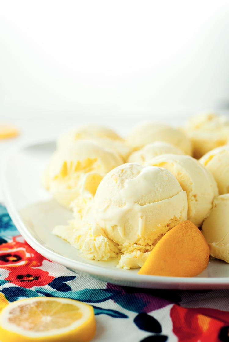 This super simple Lemon Meringue Pie Homemade Ice Cream whips up in minutes, then simply freeze and cool off with some creamy lemon goodness! Delish! | asimplepantry.com