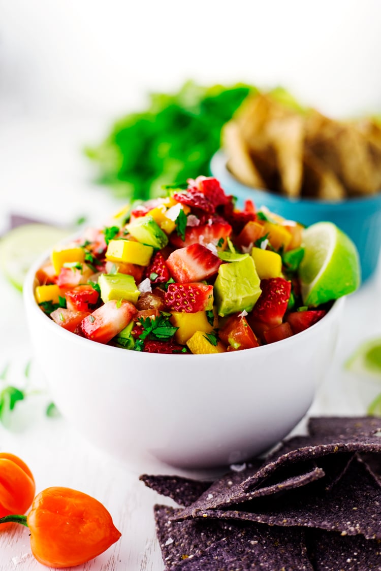 Sweet and refreshing, with a kick of heat from habañero peppers, this Strawberry Mango Salsa will please every palate! | asimplepantry.com
