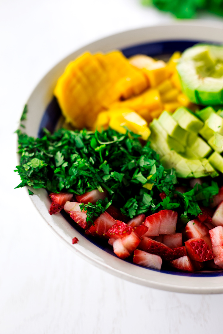 Sweet and refreshing, with a kick of heat from habañero peppers, this Strawberry Mango Salsa will please every palate! | asimplepantry.com