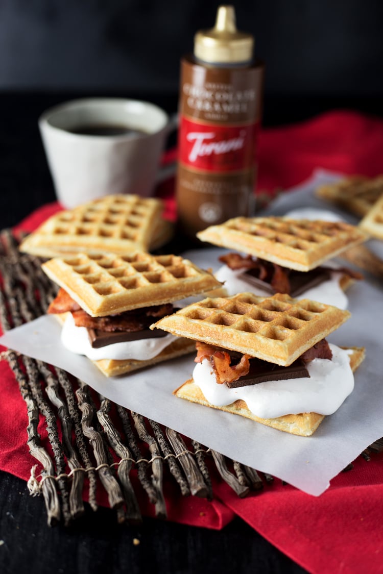 Dessert never looked better with these Bacon Waffle Smores! The perfect marriage of sweet and salty, this treat will definitely satisfy! | asimplepantry.com