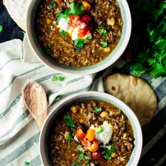 This easy Moroccan Harira is weeknight ready with its simple ingredients and one pot cooking. Go international and enjoy dinner tonight! | asimplepantry.com