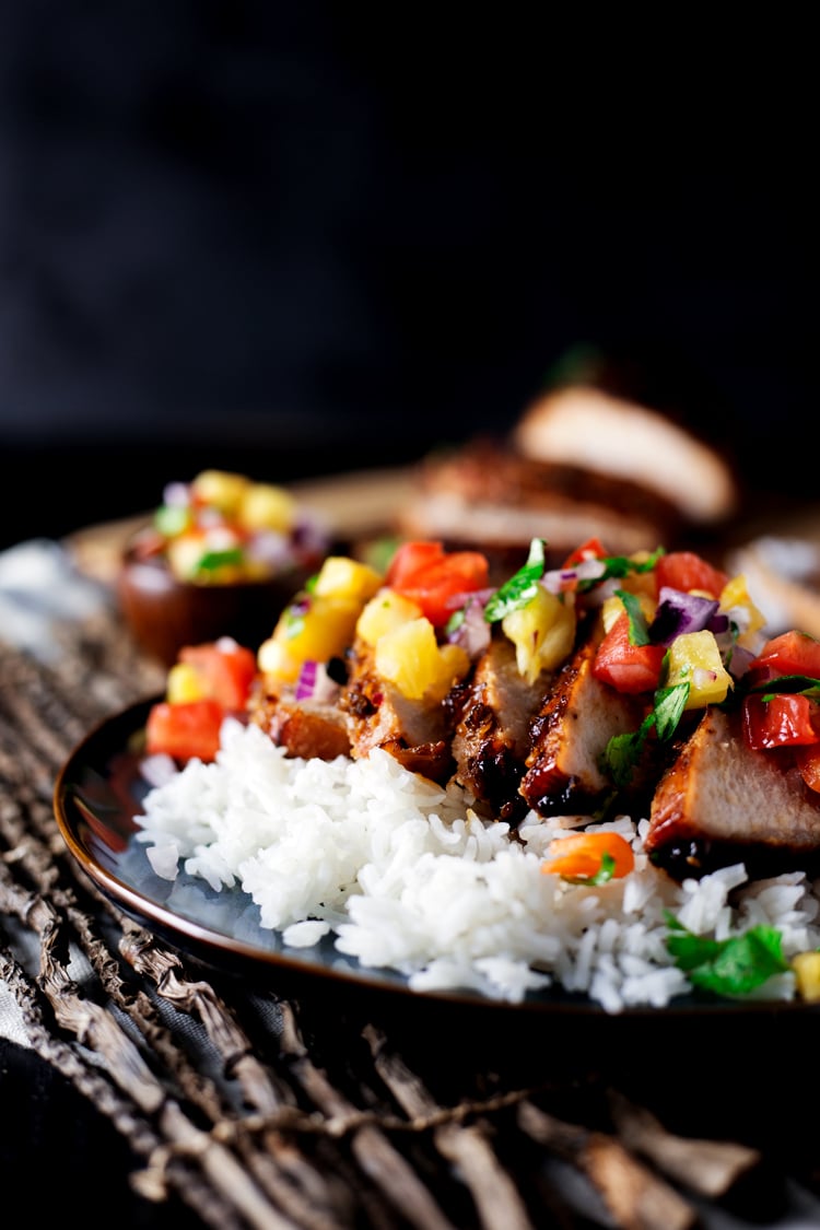 Dinner just got exotic with this amazing Teriyaki Pork with Pineapple Salsa! Dinner is on the table in just 30 minutes with this delish dish! | asimplepantry.com
