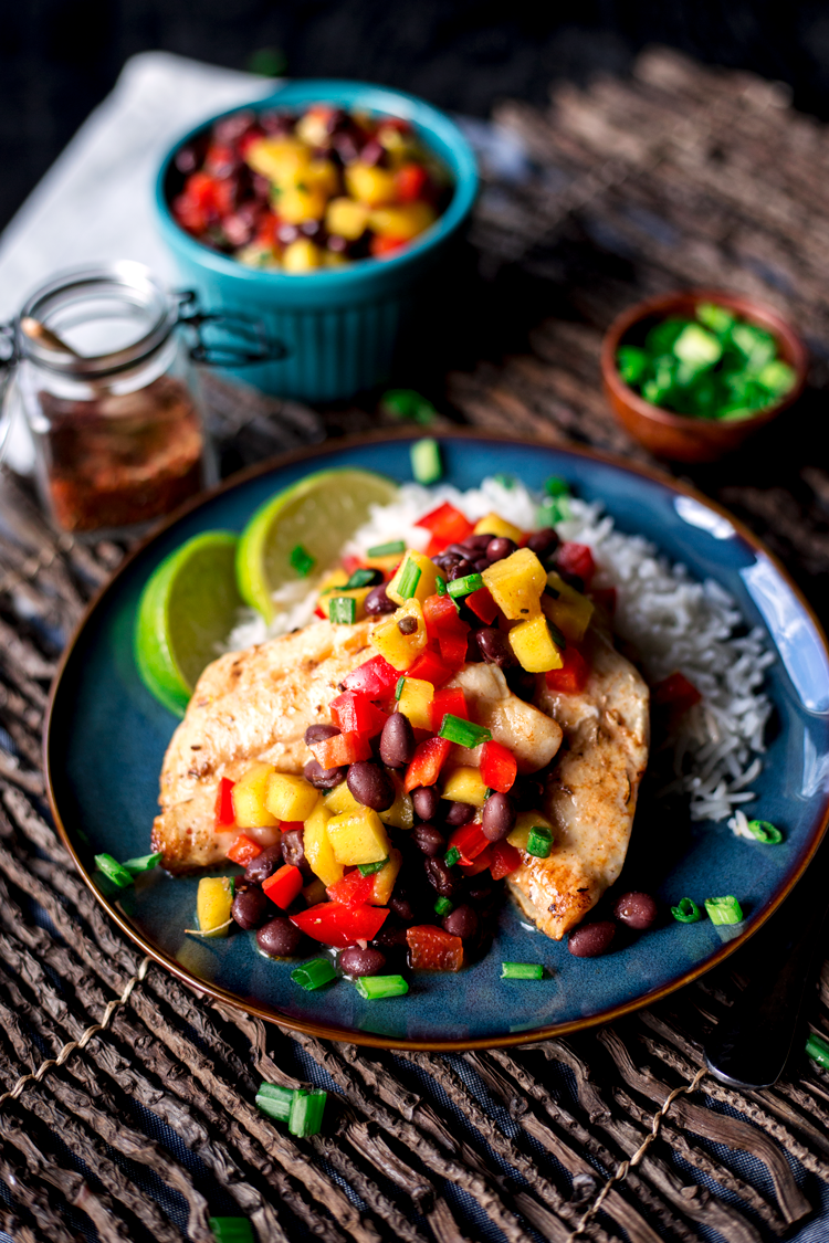 Dinner will never be the same once you've tried this amazingly fresh Spicy Salt and Lime Black Sea Bass with Mango and Black Bean Salad! | asimplepantry.com