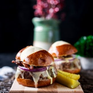 Ready in under 30 minutes, these Peppered Pork Sliders with Honey Mustard Sauce are so full of flavor, you'll want them for dinner every night! | asimplepantry.com