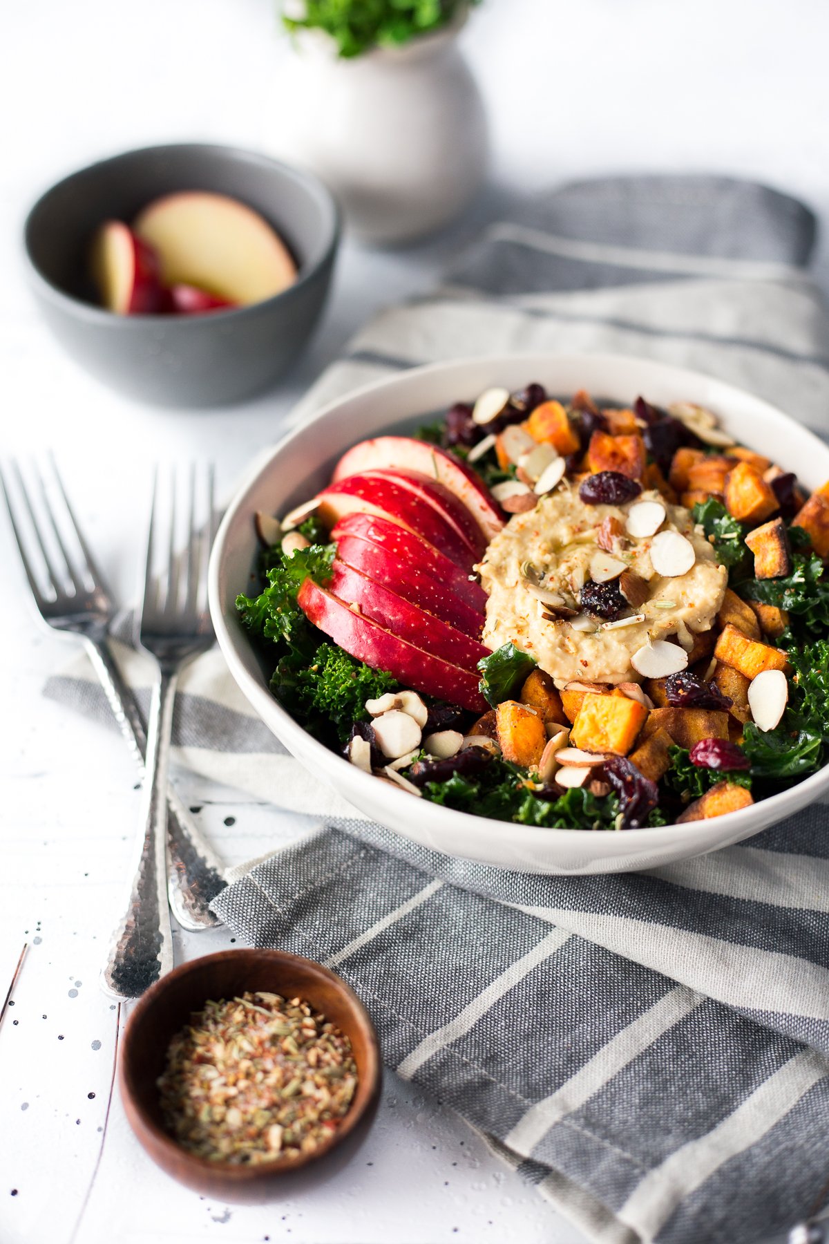 If you're in need of a hummus recipe easy enough to whip together in 30 minutes, then look no further than this amazing Winter Hummus Bowl with roasted sweet potatoes, apples, and kale. | asimplepantry.com