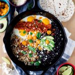 Filled with clean, whole food, this super simple skillet huevos rancheros features a homemade ranchero sauce that will tickle the tastebuds! | asimplepantry.com