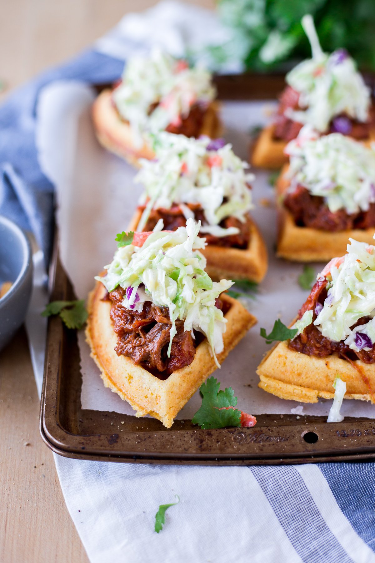 The king of savory waffle recipes, these Sweet & Smoky Pulled Pork Cornbread Waffle Sliders will leave you wanting more! Perfect as an appetizer, or for dinner! | asimplepantry.com