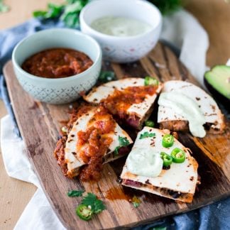 Look no further than these Cheesy Black Bean and Pork Carnitas Quesadillas if you're needing some easy Mexican recipes in your life! Dinner is served! | asimplepantry.com