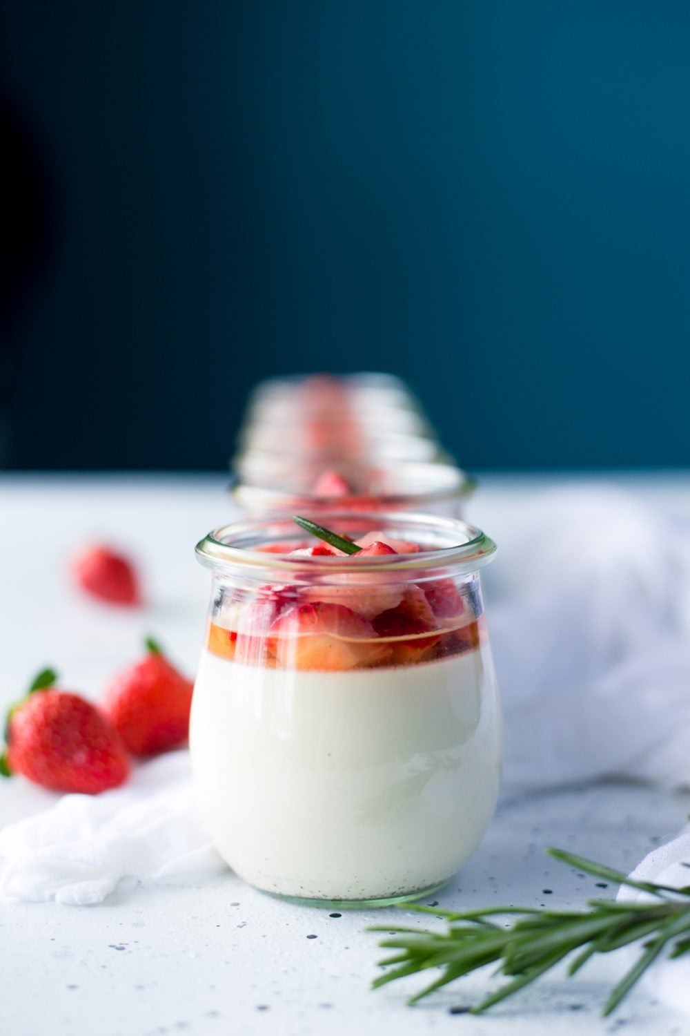 Creme Fraiche Panna Cotta with Rosemary Macerated Strawberries • A