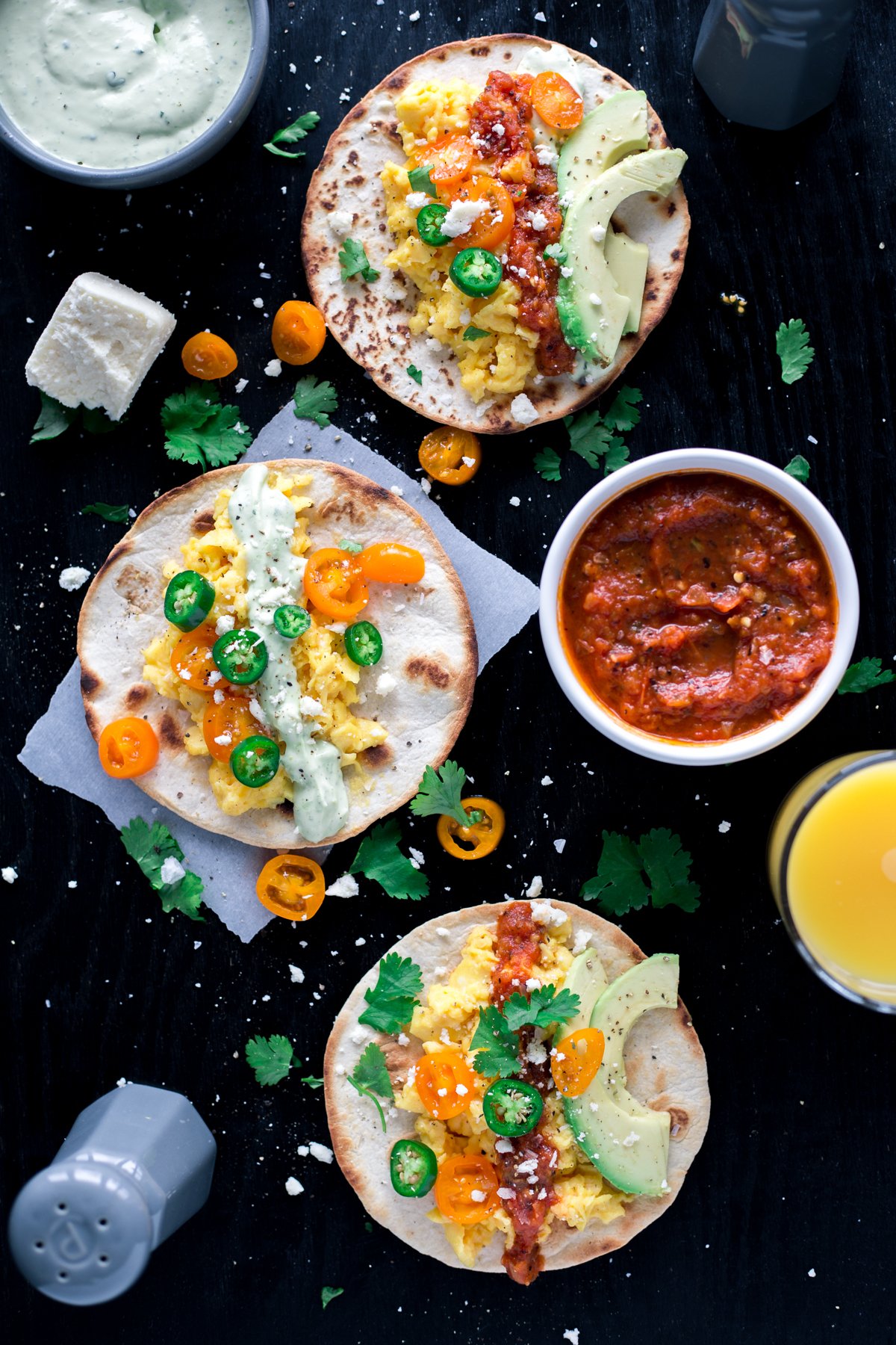 Breakfast recipes, easy and in a hurry, cannot be beat with these amazing Mexican breakfast tacos! Two blender sauces, lots of salty cheese, and fresh produce FTW! | asimplepantry.com