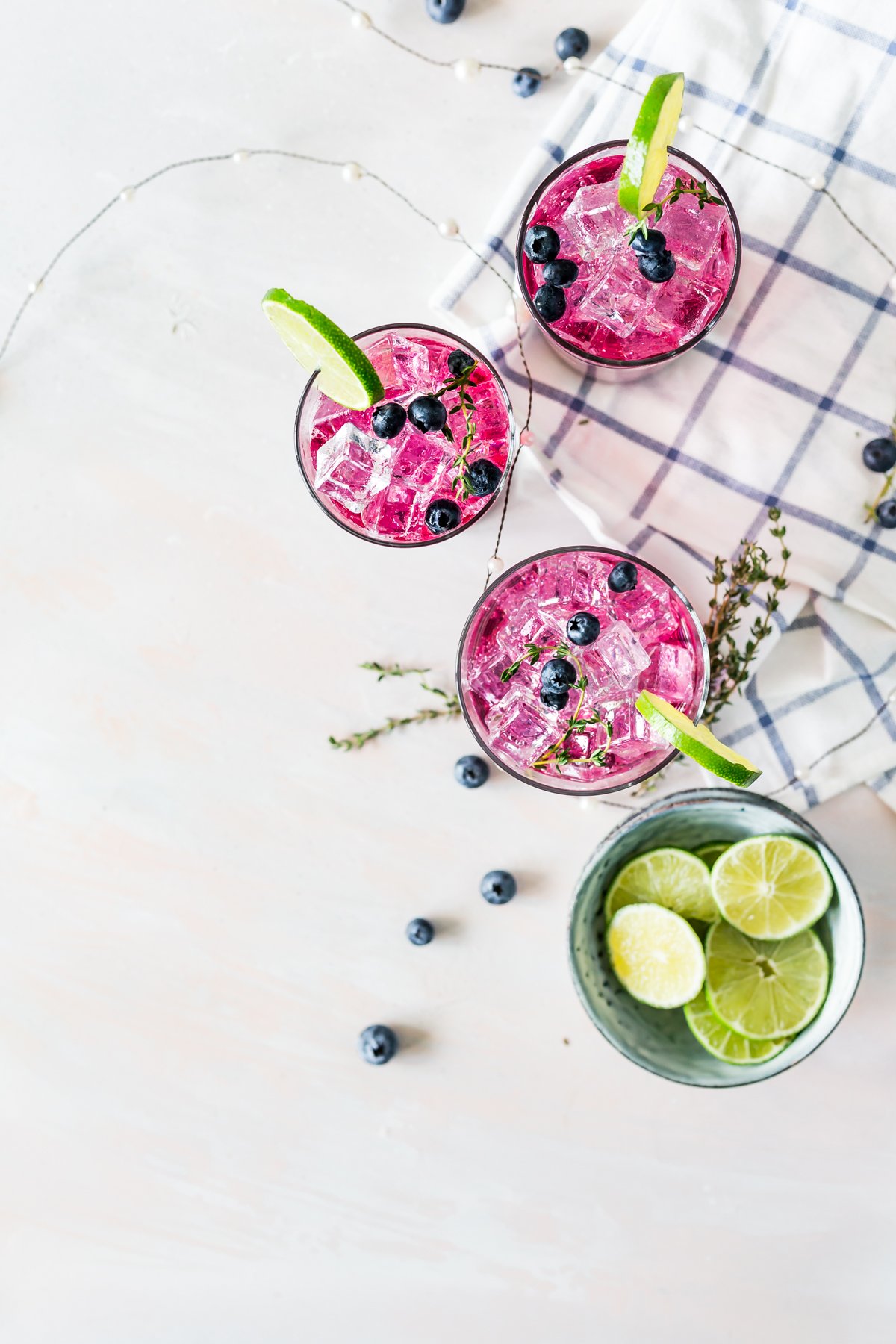You need to add this Blueberry Thyme Gin Smash to your arsenal of easy cocktail recipes; it's perfect for parties, or just hanging with friends on a warm sunny day! | asimplepantry.com