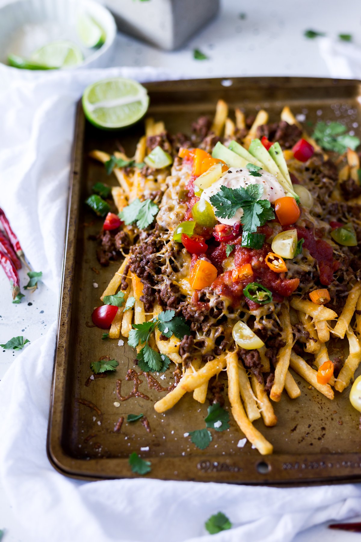 Celebrate Cinco de Mayo, or any occasion, with these Mexican Nacho Fries! Whether as an appetizer or dinner, easy Mexican recipes just cannot be beat! | asimplepantry.com