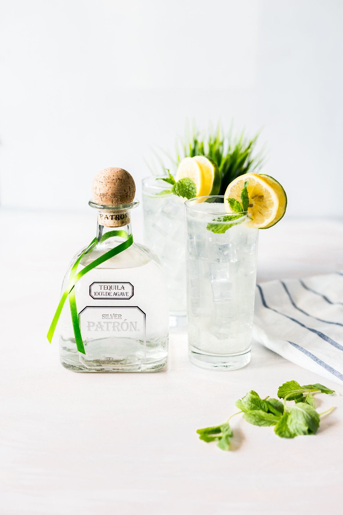 Enjoy this remix of a Minnesota classic when you whip up this easy cocktail recipe: The Tequila Bootleg! Citrus, Mint, and Patrón! | asimplepantry.com
