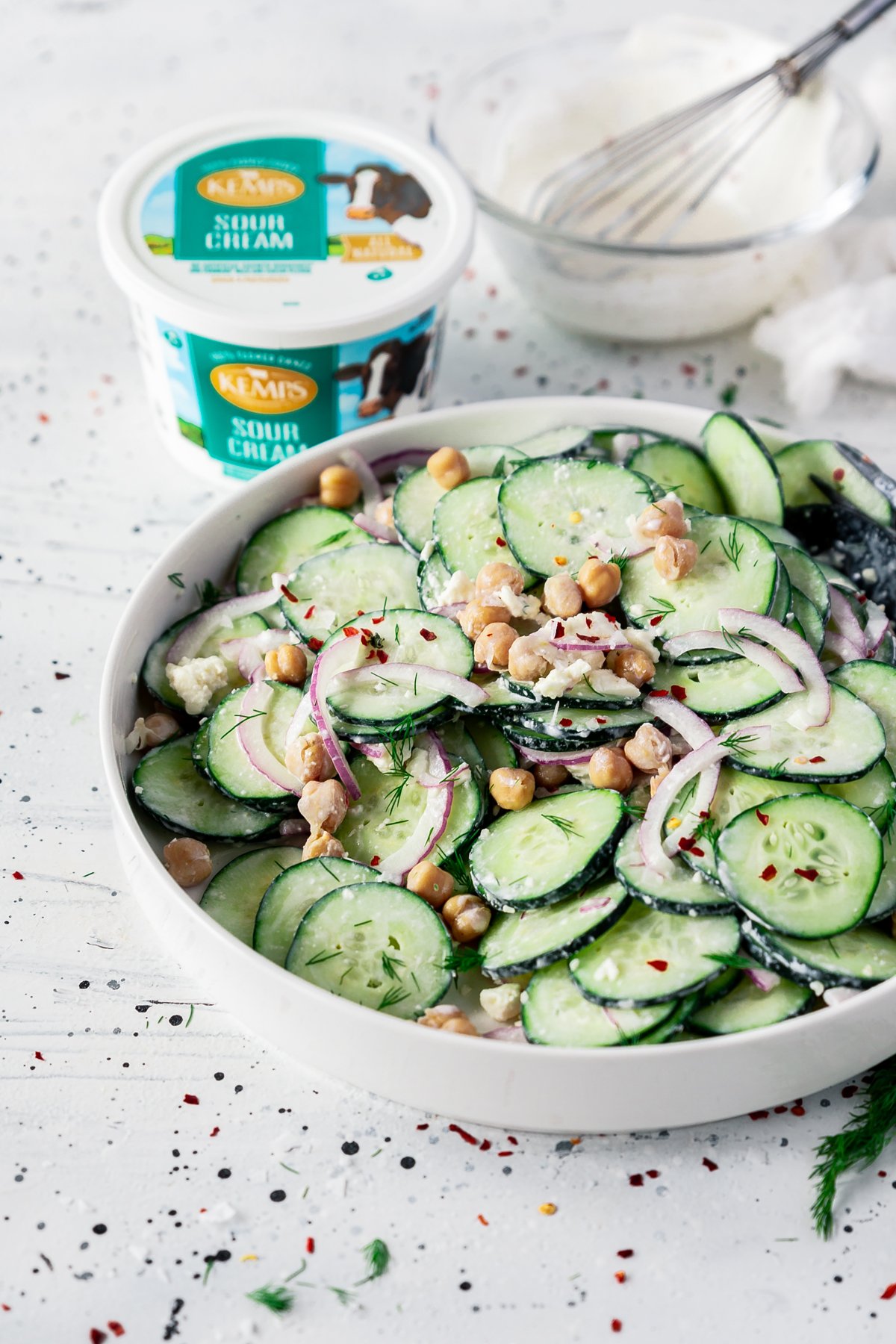 creamy cucumber salad with chickpeas, red onion, feta, and dill.