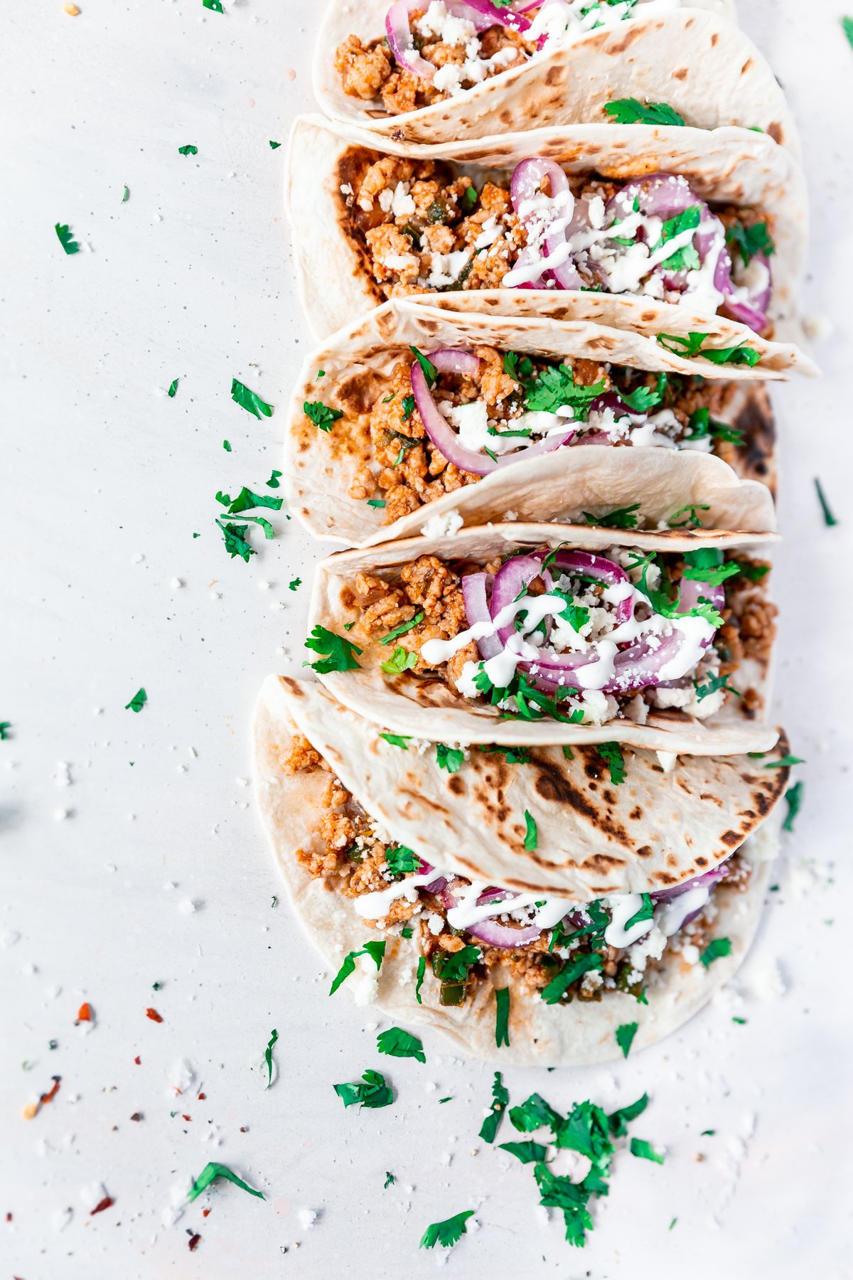angled view of weeknight pork carnitas tacos by minnesota food blogger a simple pantry